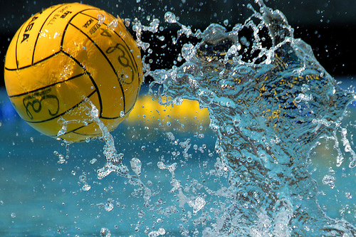 A waterpolo ball making a splash